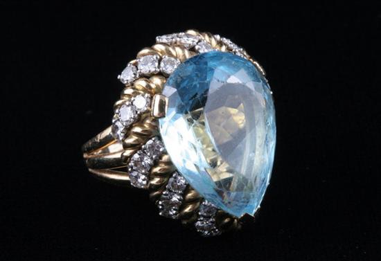 Appraisal: YELLOW GOLD DIAMOND AND AQUAMARINE RING Circa Fancy-cut pear shape