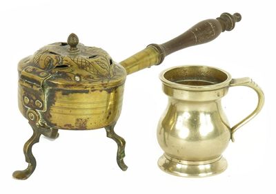 Appraisal: A Dutch brass chafing dish with a pierced and engraved