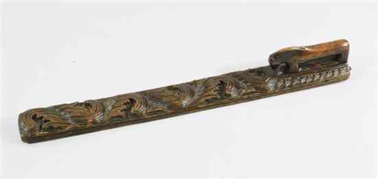 Appraisal: A mangle board Norwegian th century the handle in the