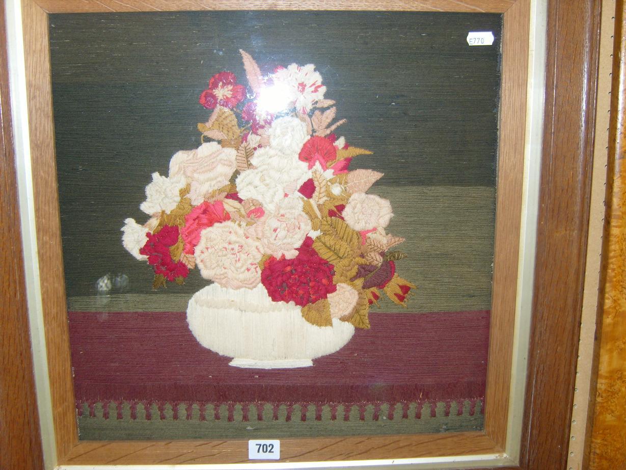 Appraisal: A Victorian wool work picture of a vase of flowers