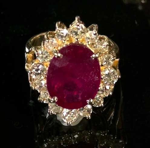 Appraisal: Fourteen-Karat Yellow Gold Ruby and Diamond Dinner Ring featuring a