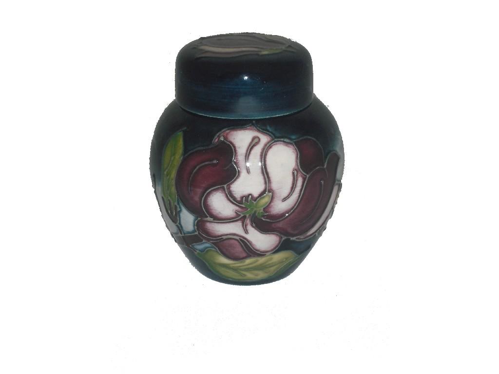 Appraisal: Modern Moorcroft ginger jar and cover decorated with magnolias upon