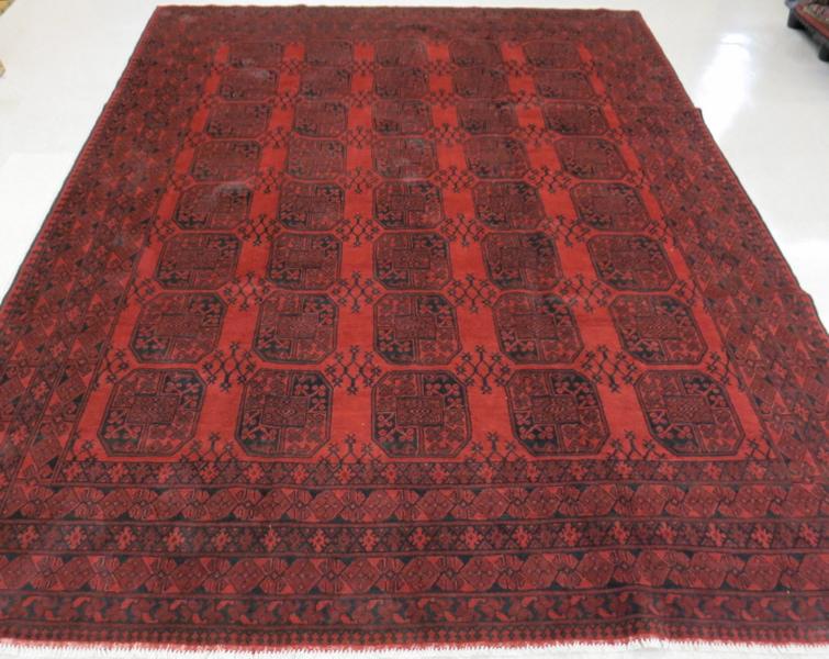 Appraisal: HAND KNOTTED ORIENTAL CARPET Afghan Ersari tribal featuring five columns