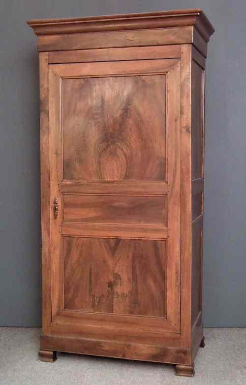 Appraisal: A th Century French panelled walnut armoire with moulded cornice