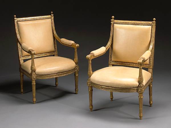 Appraisal: A pair of Louis XVI style giltwood fauteuils a la