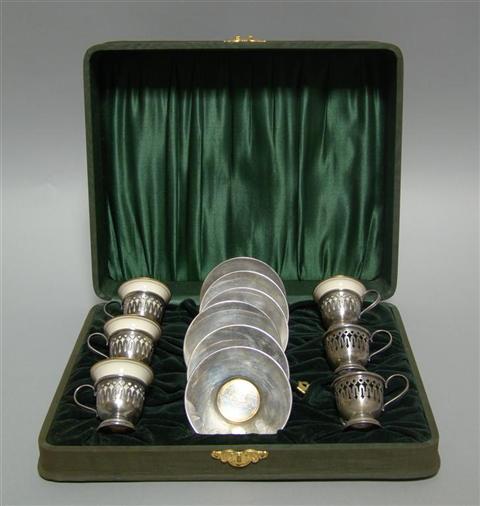 Appraisal: HARFORD SILVER COMPANY CASED DEMITASSE SET Of Lenox porcelain liners