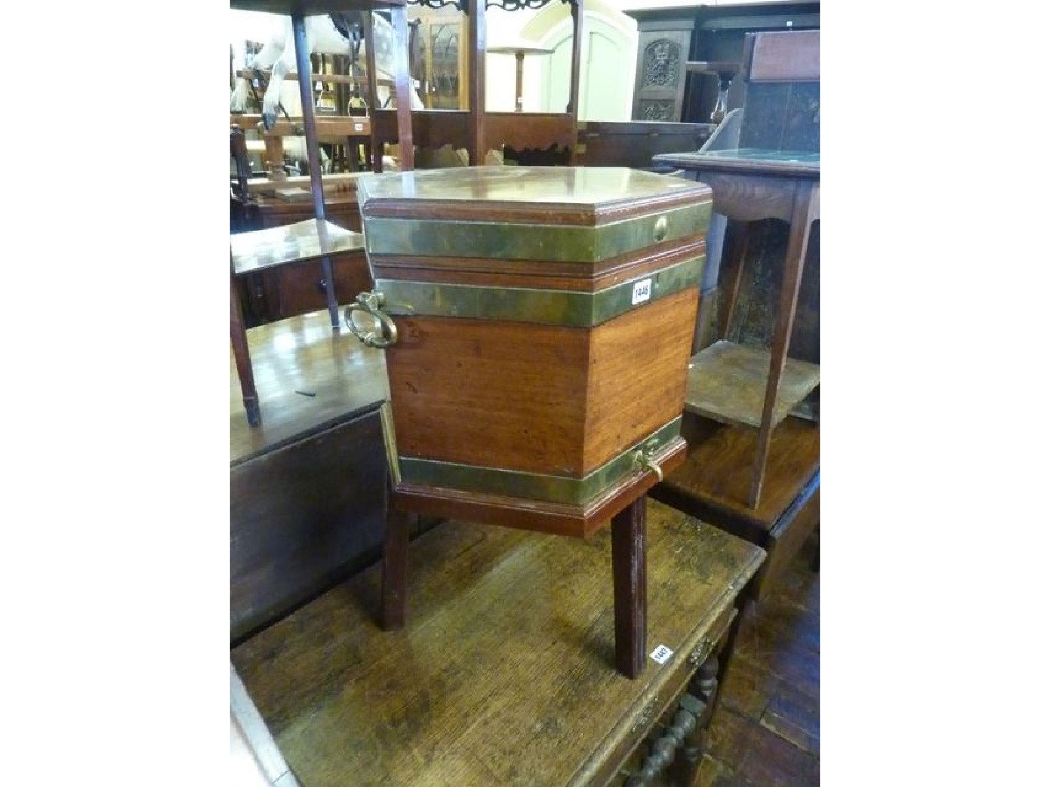 Appraisal: A Georgian mahogany cellarette or wine cooler of hexagonal form