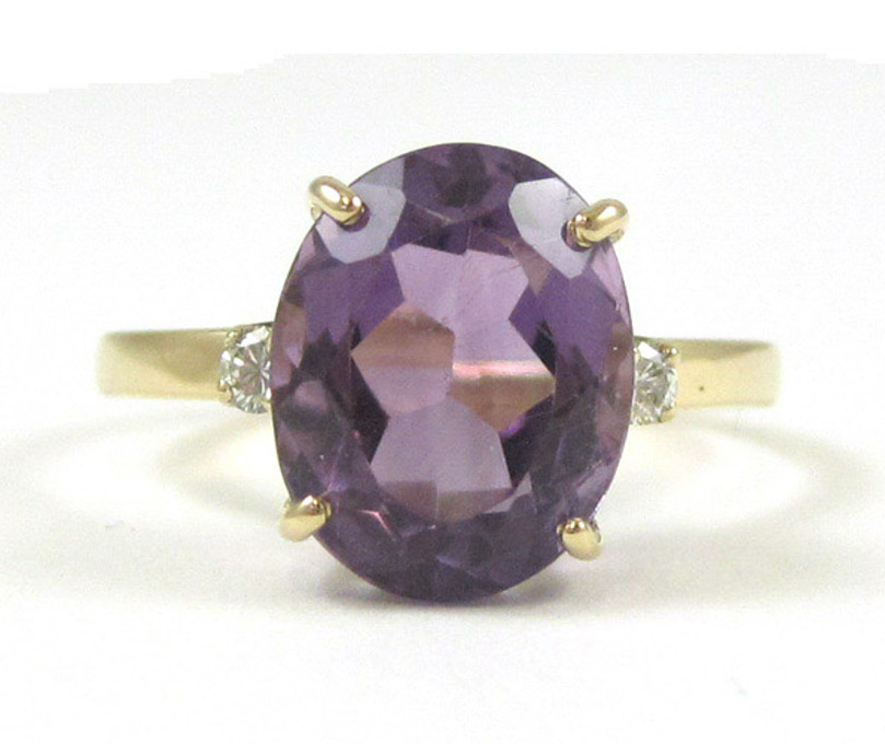 Appraisal: AMETHYST DIAMOND AND FOURTEEN KARAT GOLD RING set with two