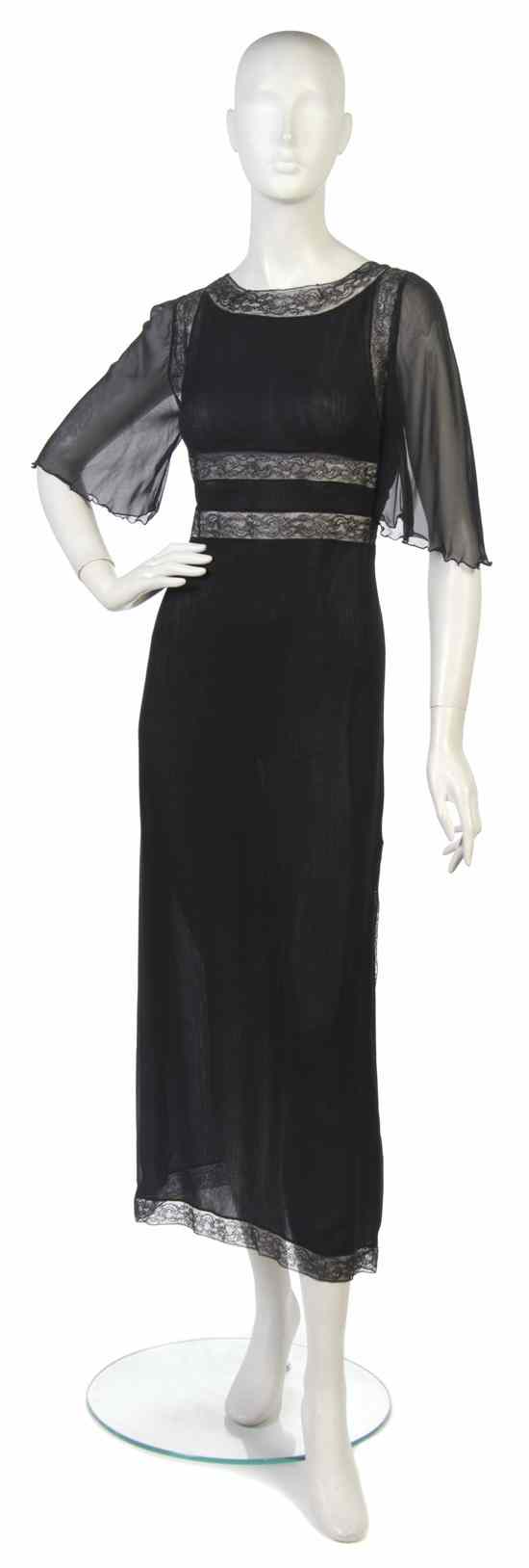 Appraisal: A Valentino Black Silk Chiffon and Lace Evening Gown Labeled