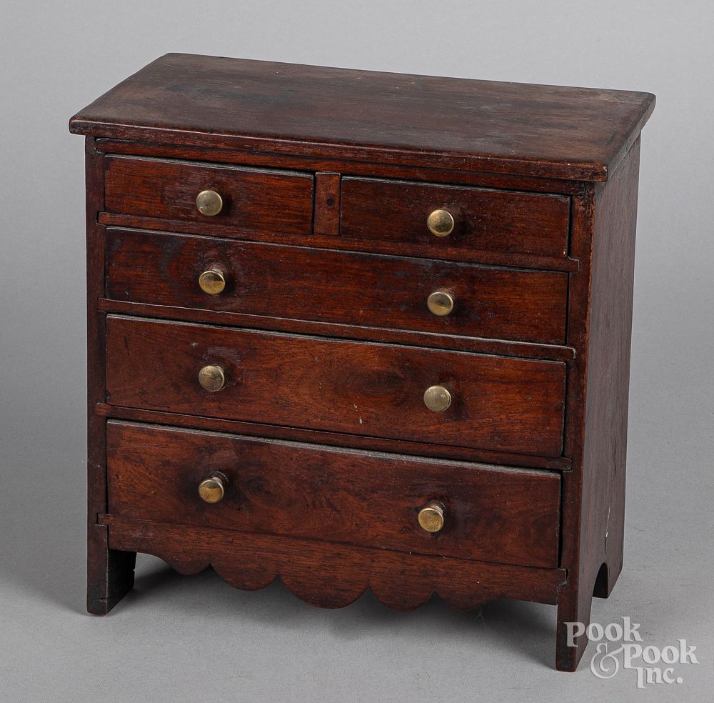 Appraisal: Miniature walnut chest of drawers th c Miniature walnut chest