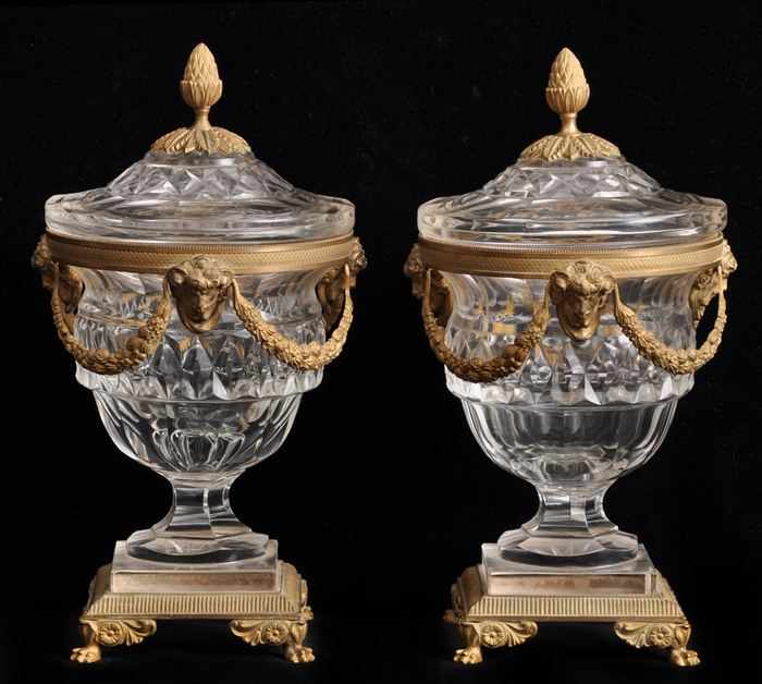 Appraisal: PAIR OF EMPIRE-STYLE GILT-BRONZE MOUNTED CUT-GLASS URNS AND COVERS Each