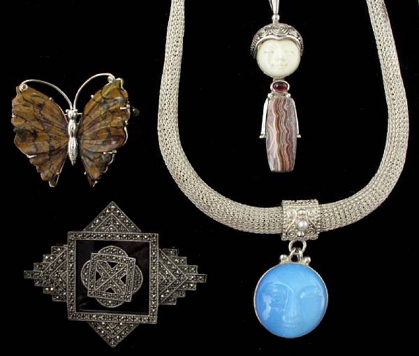 Appraisal: A collection of signed high-end silver jewelry featuring five brooches