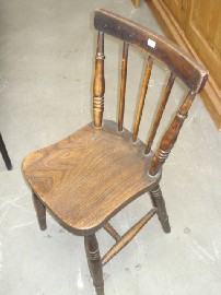 Appraisal: A pair of nineteenth century provincial chairs with saddle seals