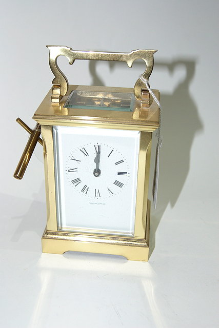 Appraisal: A BRASS CARRIAGE TIMEPIECE retailed by Mappin Webb Ltd