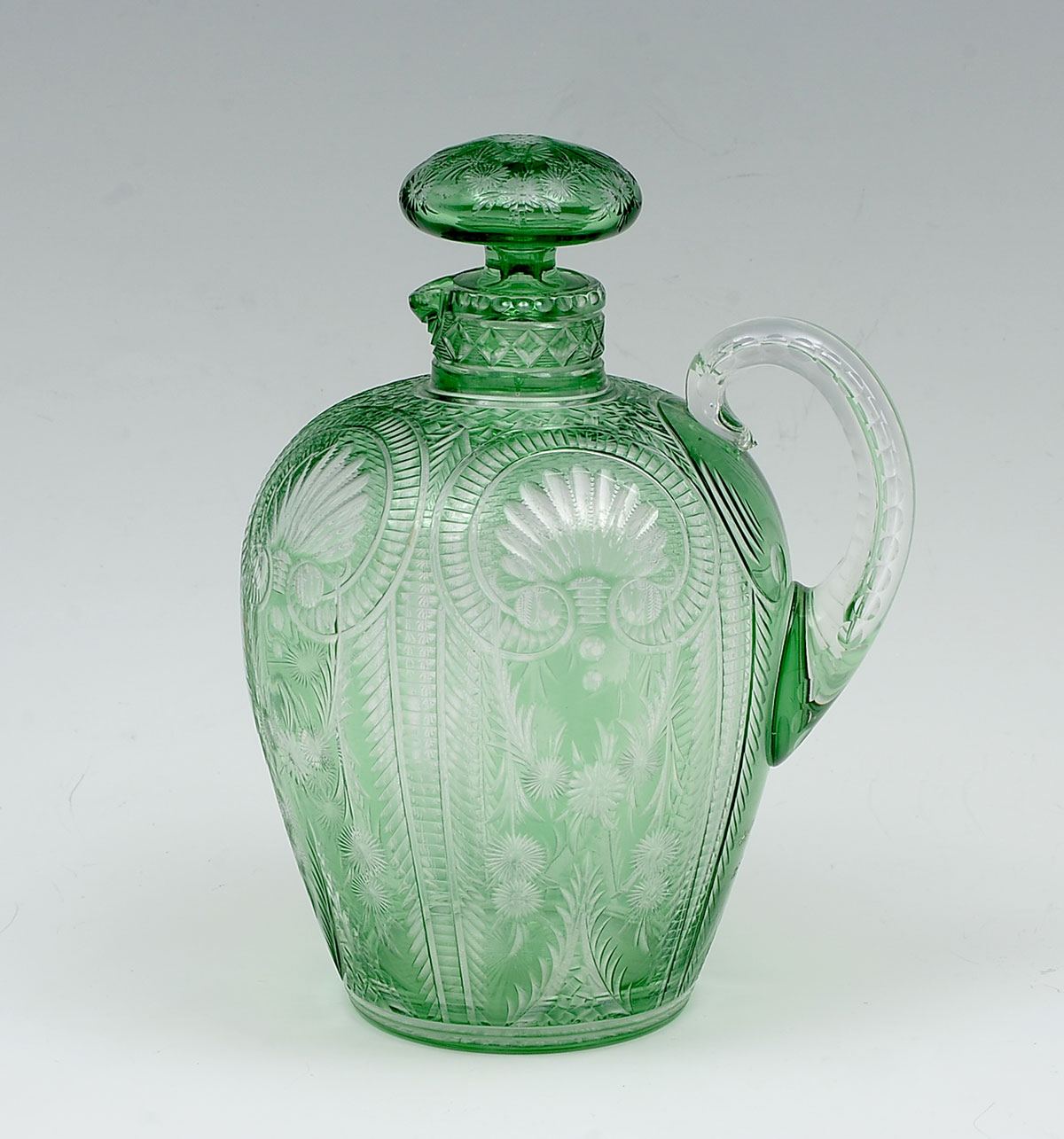 Appraisal: GREEN CUT GLASS JUG ATTRIBUTED TO STEVENS WILLIAMS Green cut