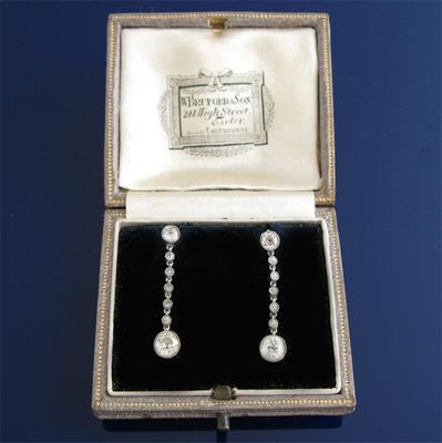 Appraisal: An Edwardian pair of diamond drop earrings the circular cut