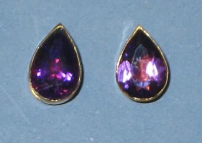 Appraisal: A PAIR OF AMETHYST EAR STUDS of pearl form collet