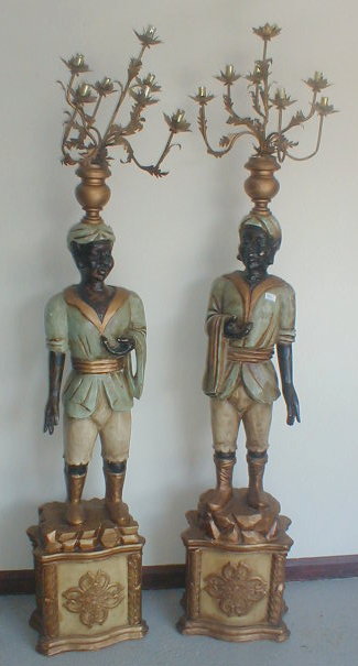 Appraisal: A pair of carved gilt and painted Blackamoor electrolier figures