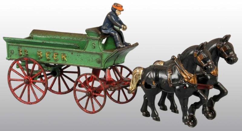 Appraisal: Cast Iron Kenton Beer Wagon Toy Description Pulled by two