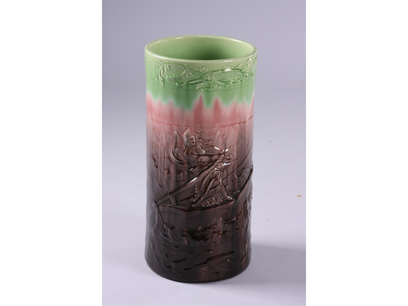 Appraisal: Majolica Umbrella Stand cylindrical relief portrayal of allegorical figures struggling