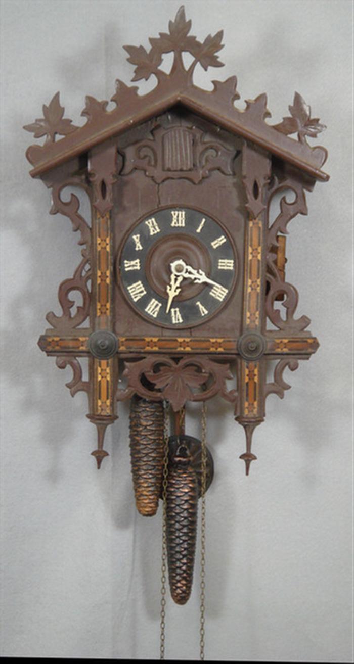 Appraisal: Carved inlaid Black Forest cuckoo clock weights pendulum high running