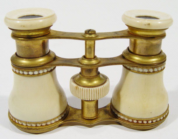 Appraisal: Pair of adjustable ivory opera glasses with jewelled decoration