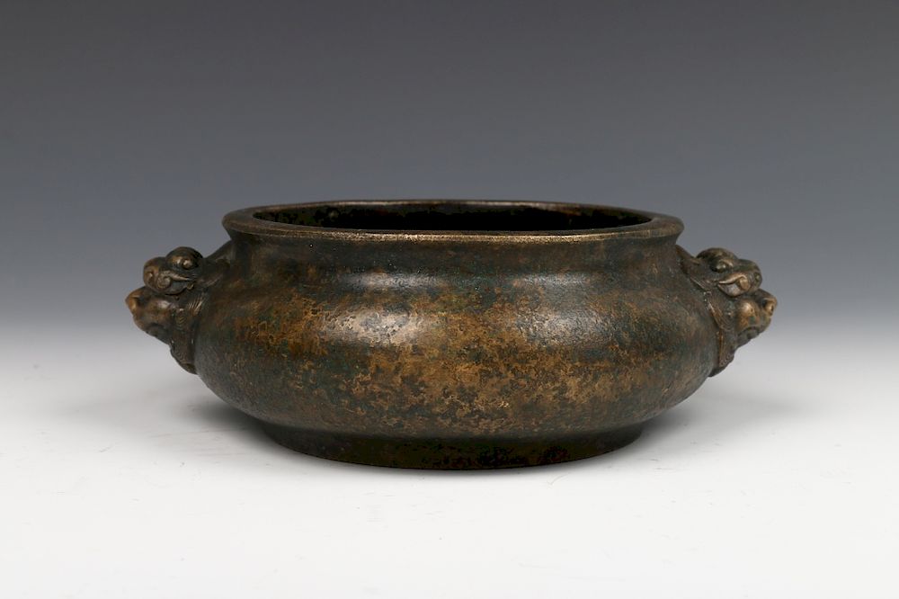 Appraisal: BRONZE DOUBLE-EAR BURNER XUANDE MARK Of compressed globular body rising