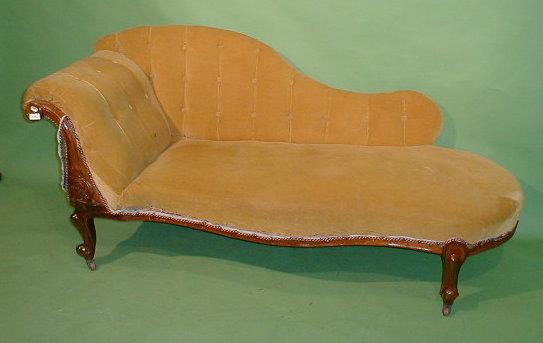 Appraisal: A Victorian mahogany chaise longue of serpentine form with scroll