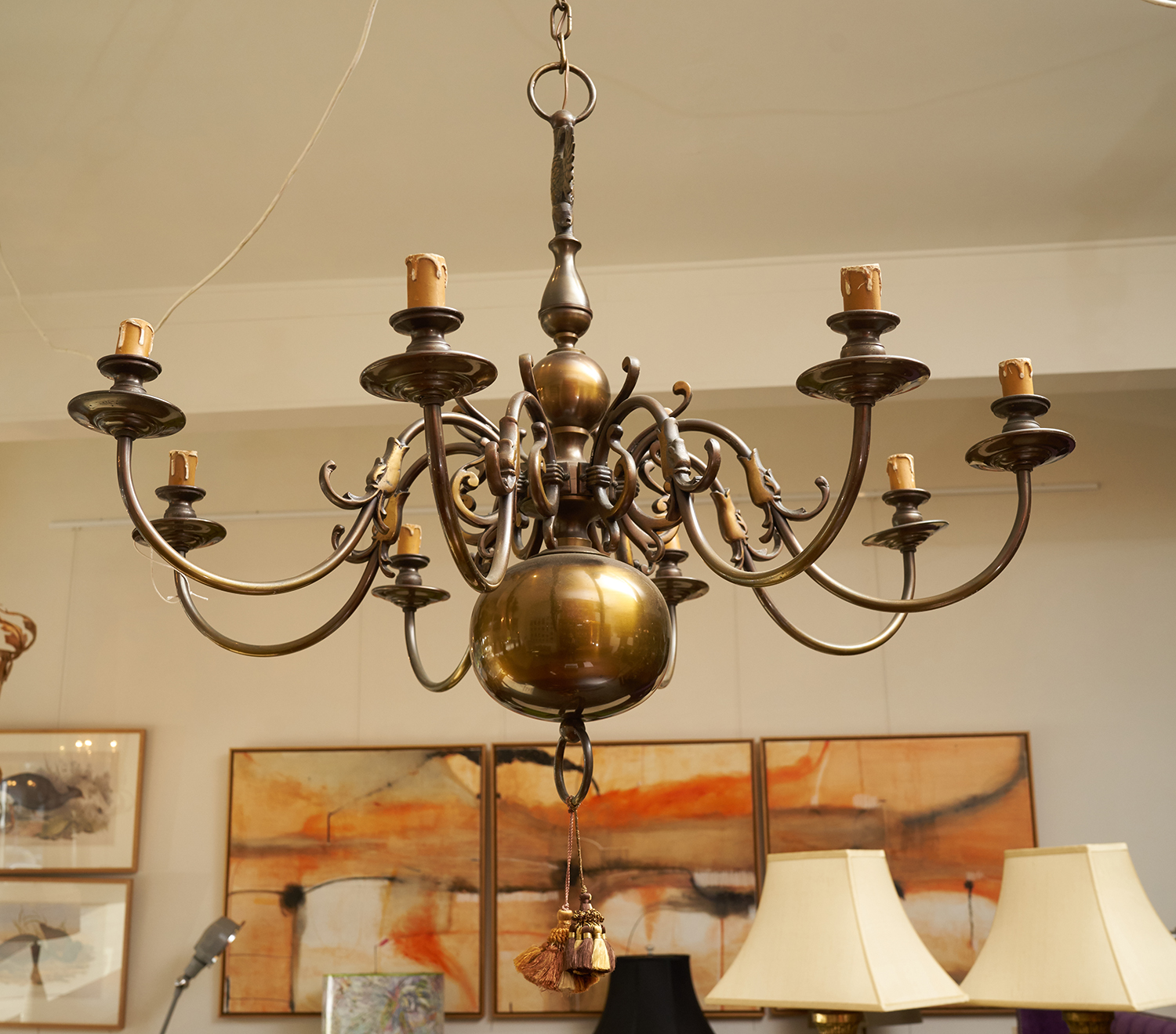 Appraisal: A FLEMISH STYLE EIGHT BRANCH CHANDELIER Brass with bird motifs