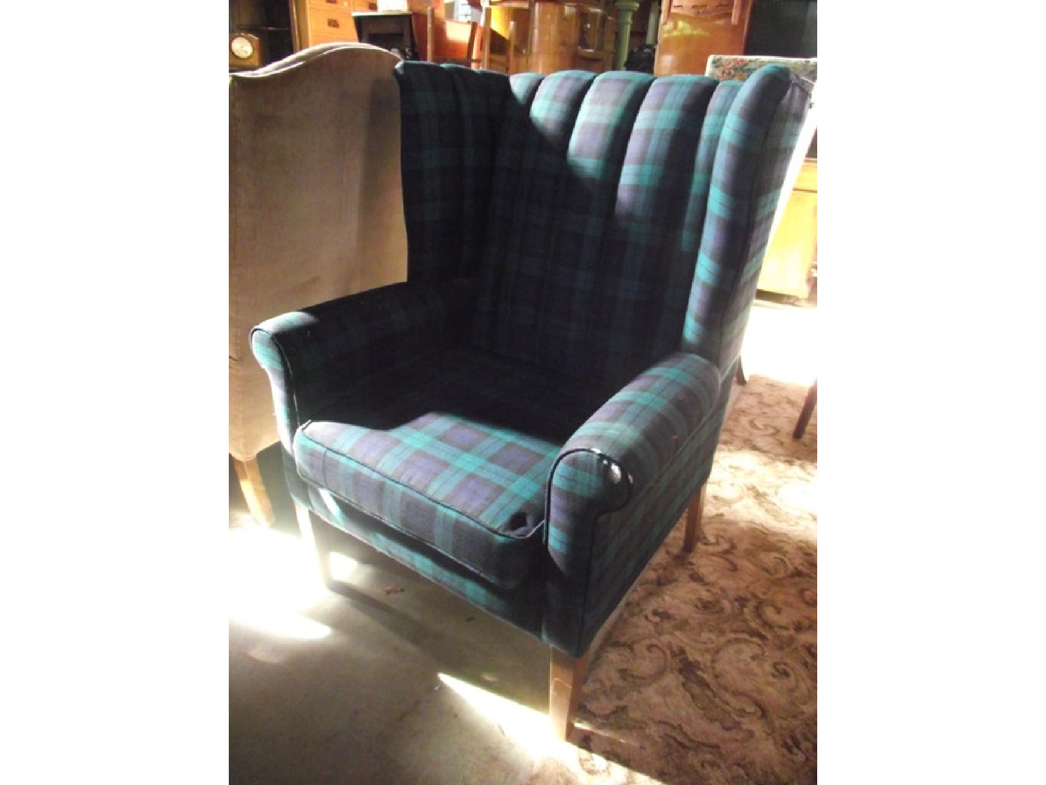 Appraisal: A Georgian style wing armchair with tartan type upholstered finish