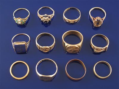 Appraisal: Eleven assorted gold rings and a large gold plated signet