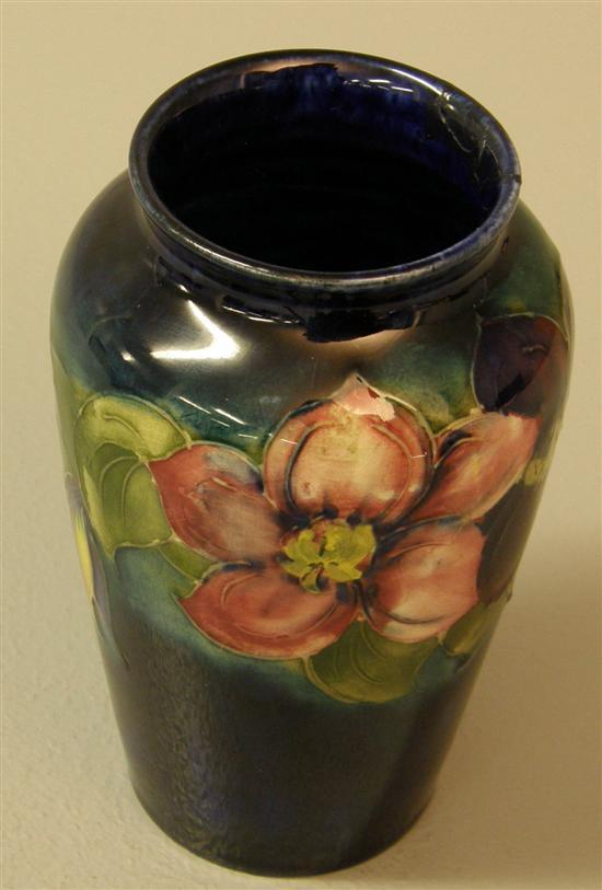 Appraisal: Moorcroft vase of elongated ovoid form decorated with Clematis on