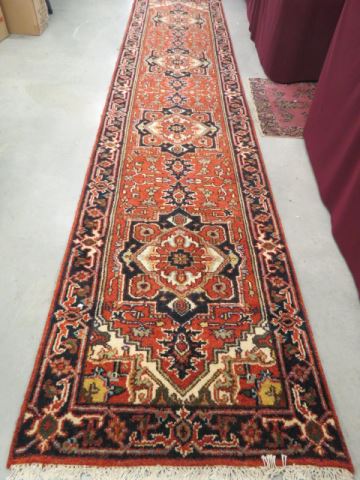 Appraisal: Heriz Persian Handmade Runner four medallions stylized florals salmon field