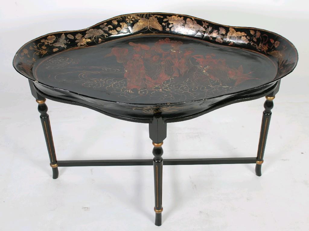 Appraisal: ORIENTAL BLACK LACQUERED AND PAINTED PAPIER MACHE TRAY quatrefoil form