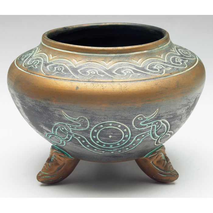 Appraisal: Norse bowl footed shape with incised designs under a metallic