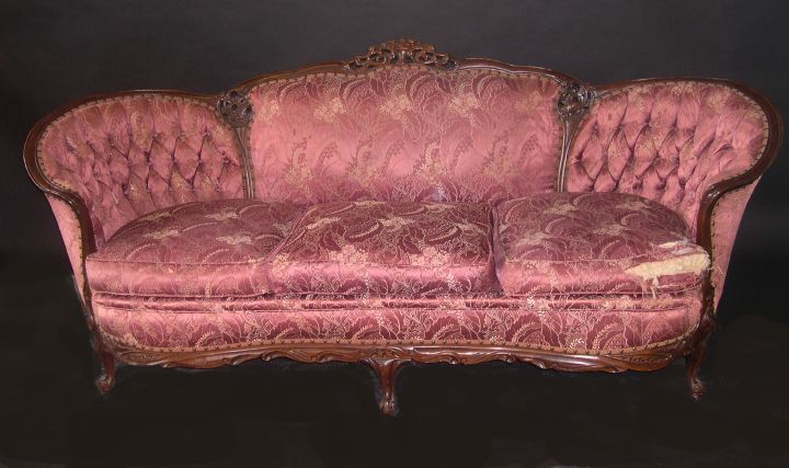 Appraisal: Victorian Mahogany Sofa fourth quarter th century the padded back