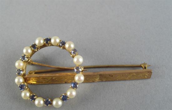 Appraisal: Two Gold Pins to Include a gold pearl and synthetic