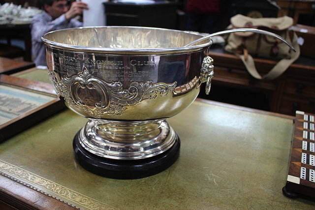 Appraisal: A SILVER PLATED PUNCH BOWL with two scroll and foliate