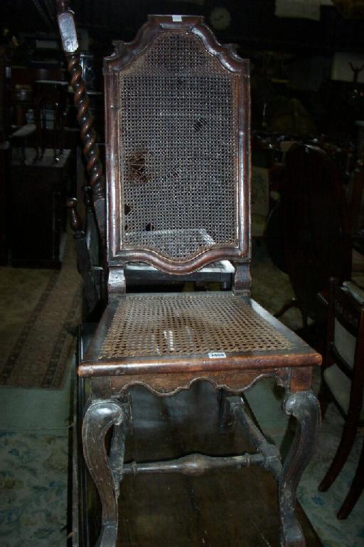 Appraisal: An early th century walnut single chair with cane seat