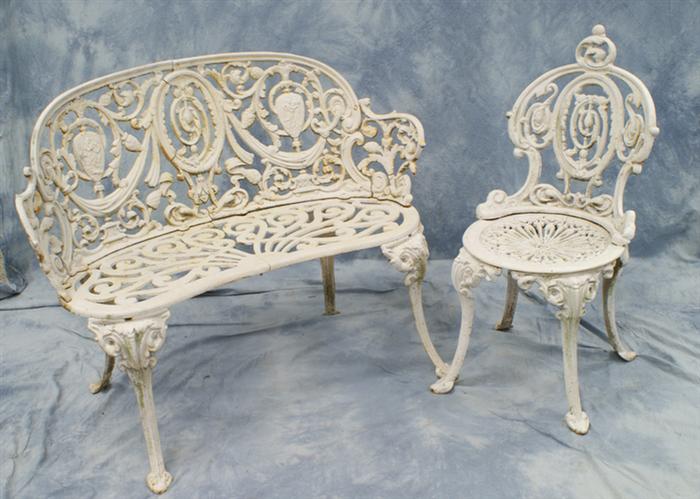 Appraisal: Cast iron settee w with matching side chair Estimate -