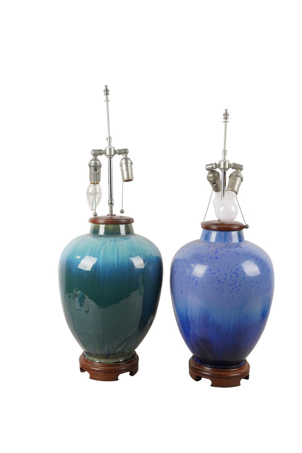 Appraisal: TWO BLUE-GLAZED JAR-FORM TABLE LAMPSwith variation in color Condition Both