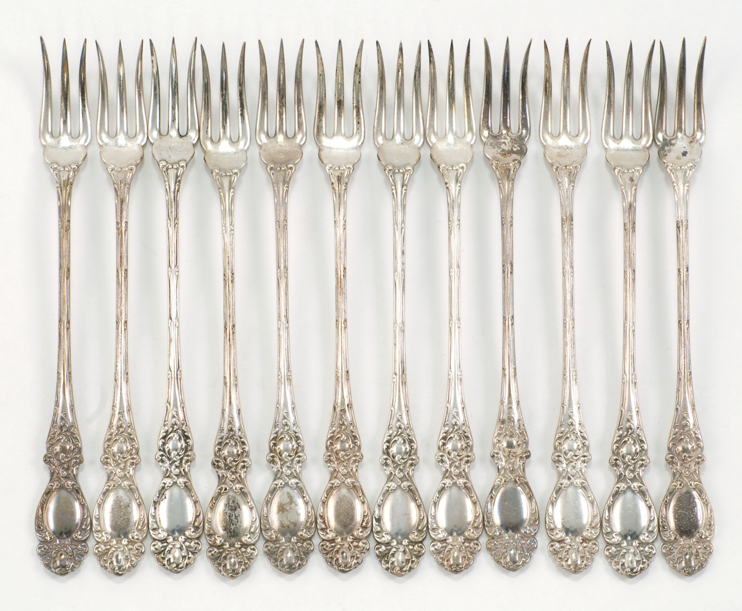 Appraisal: SET OF TWELVE STERLING SILVER OYSTER FORKS BY WALLACE In