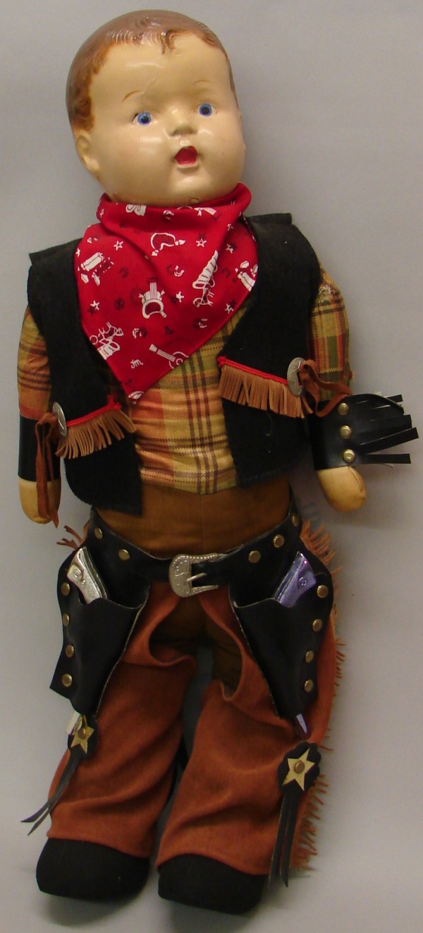 Appraisal: Unmarked cowboy doll Painted features hair Cloth body Dressed in