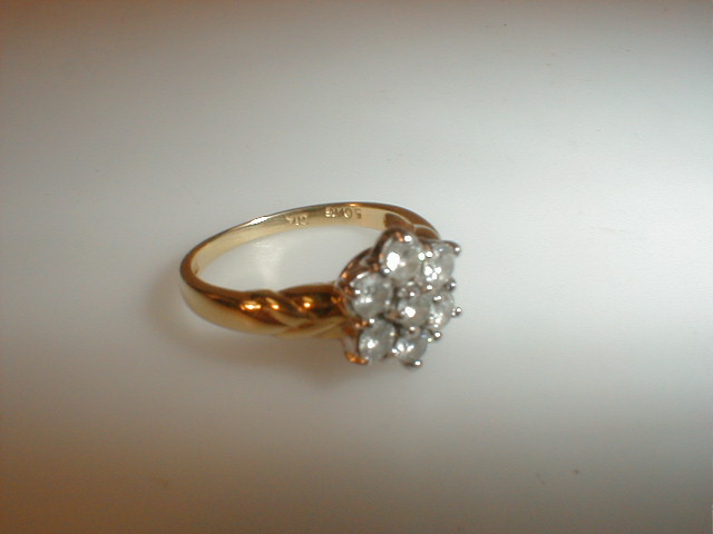 Appraisal: A diamond set cluster ring of seven diamonds total mounted