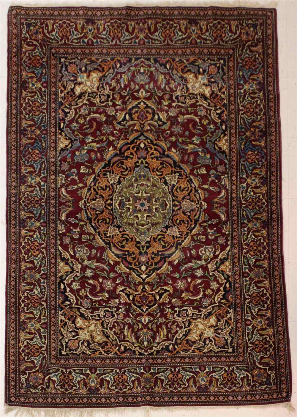 Appraisal: PERSIAN RED SILK ISFAHAN RUG single medallion surrounded with vines