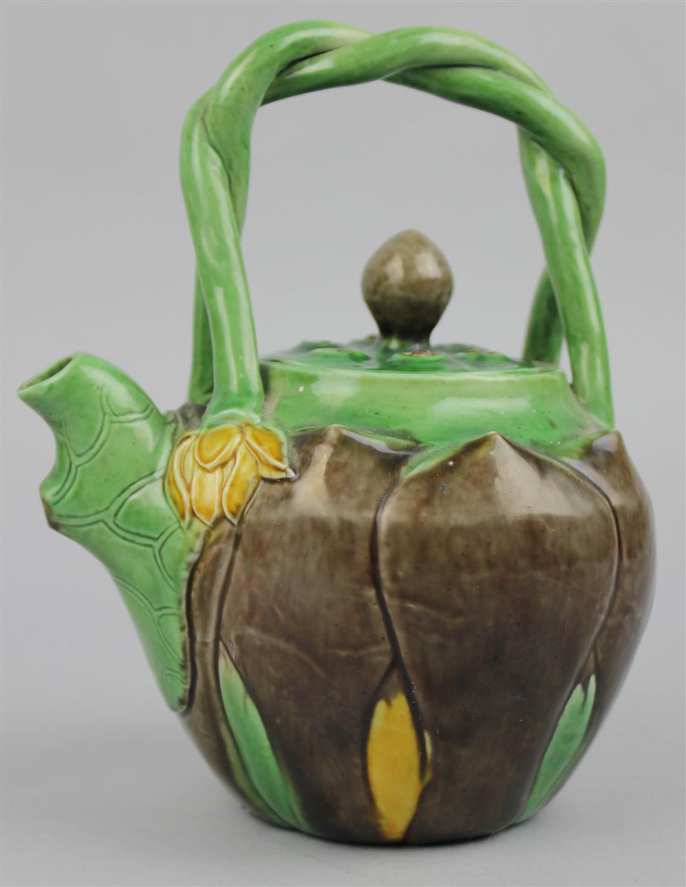 Appraisal: CHINESE SPINACH AND EGG-GLAZED LOTUS-FORM TEAPOT AND COVER TH C