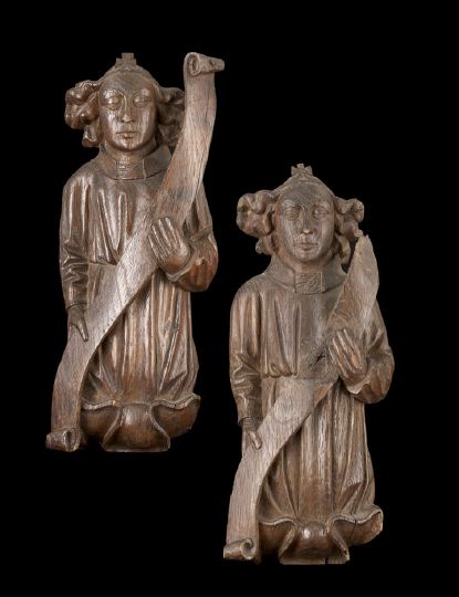 Appraisal: Pair of English Carved Oak Figural Quarter-Pilasters third quarter th