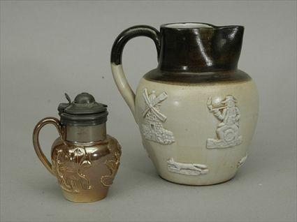 Appraisal: Two Earthenware Pitchers