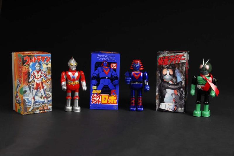 Appraisal: Lot of Tin Superhero Wind-Up Toys Description Japanese Includes Blue