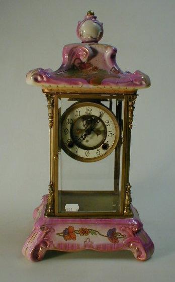 Appraisal: A thC Continental four glass mantel clock enamelled two-part dial